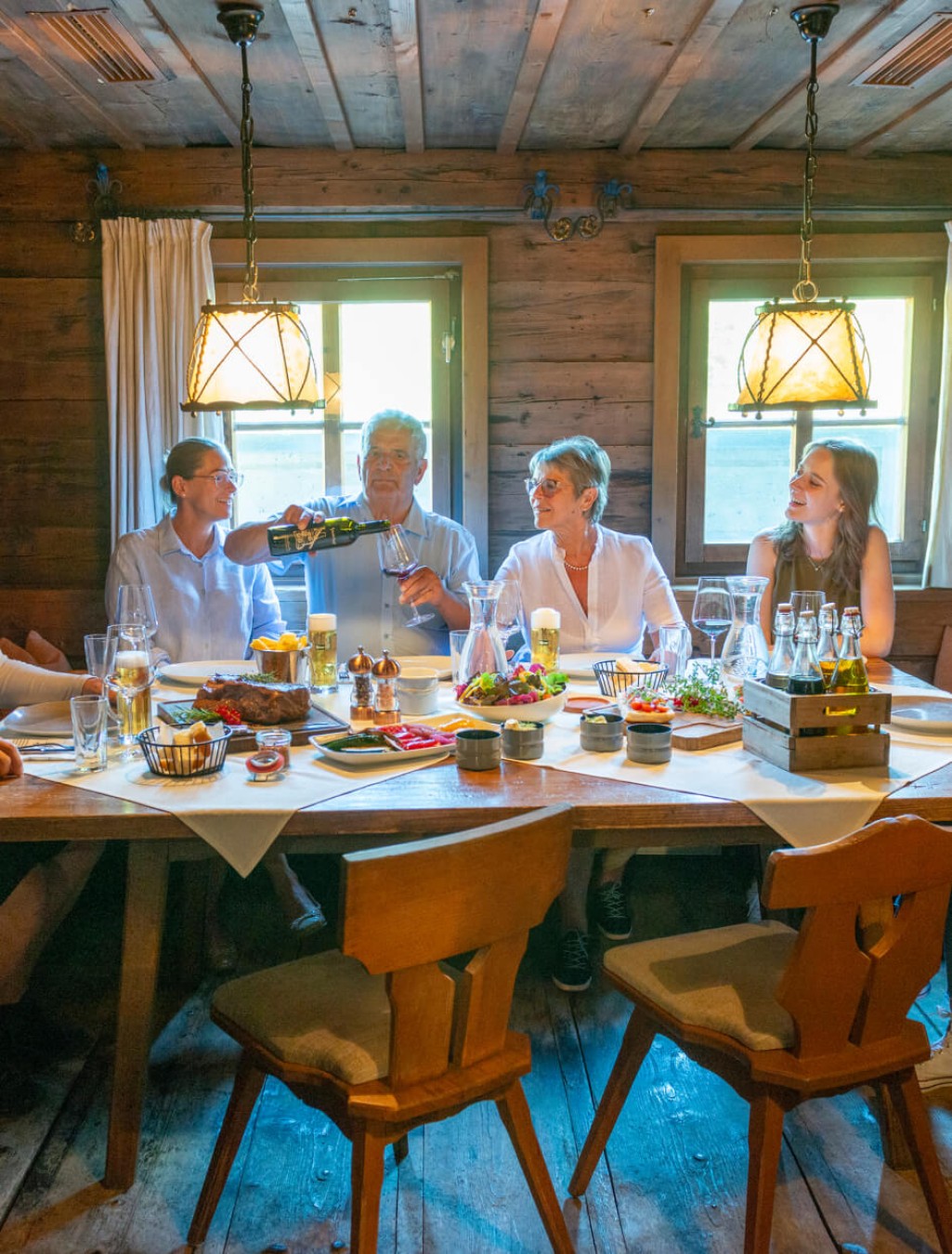 Family dinner at steakhouse Schusterhäusl